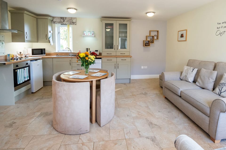 Luxury Cottage, 1 Bedroom, Garden View | Living area | Flat-screen TV, DVD player, heated floors
