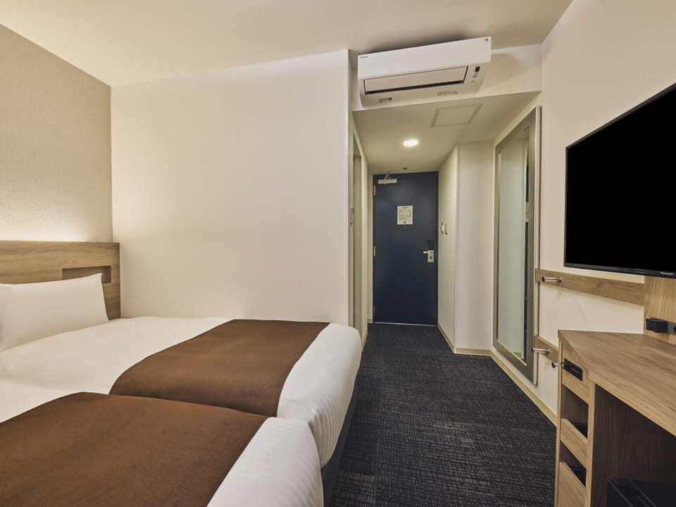 Twin Room, Non Smoking (Main Building) | In-room safe, iron/ironing board, free wired internet, bed sheets