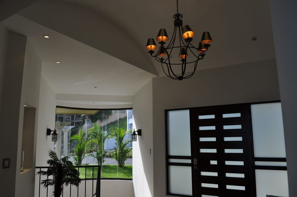 Interior entrance curve stairway walking downstairs to Pool and other facilities