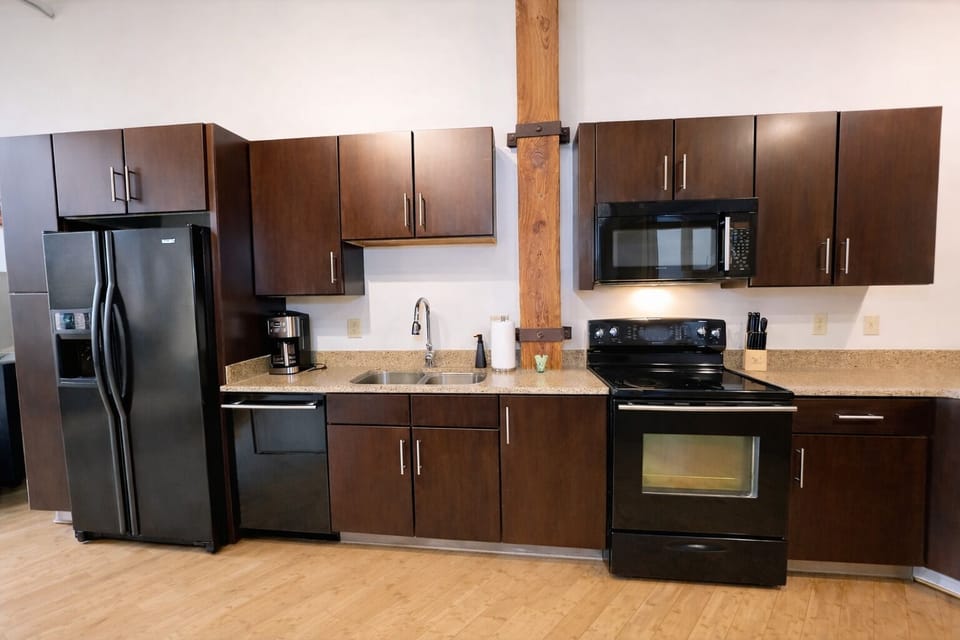 Full kitchen with standard coffee maker.