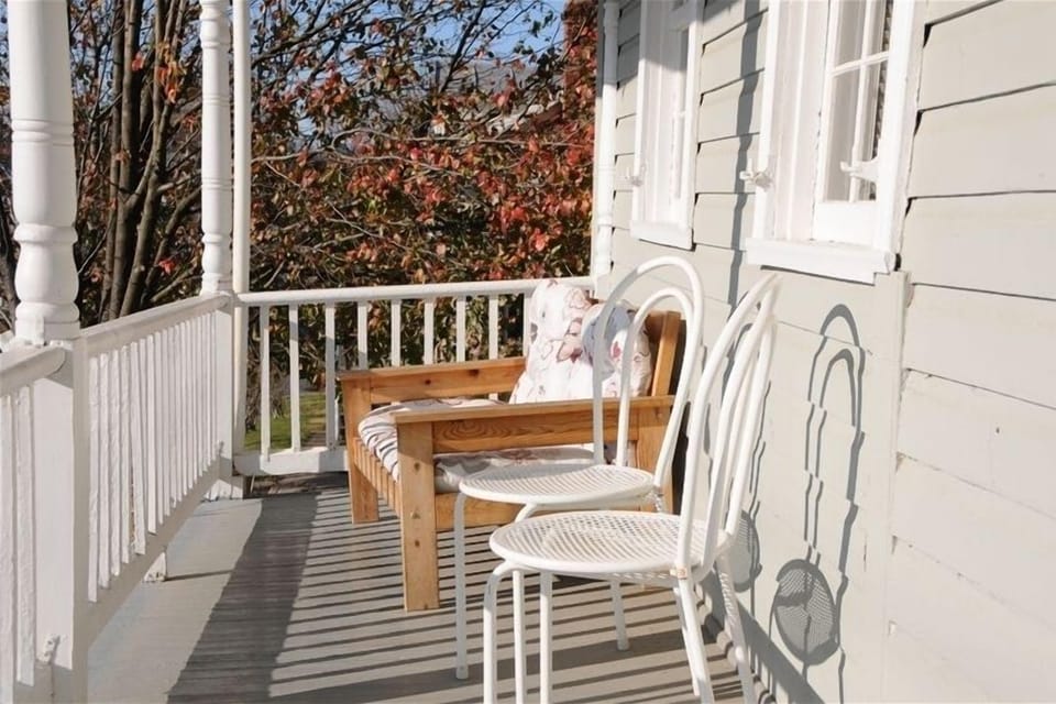 Fall is fabulous from the front porch; bask in the autumn sunshine.