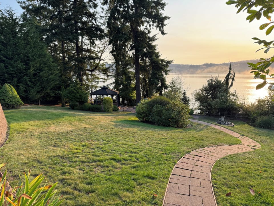 Path winding to the lower yard and fire pit