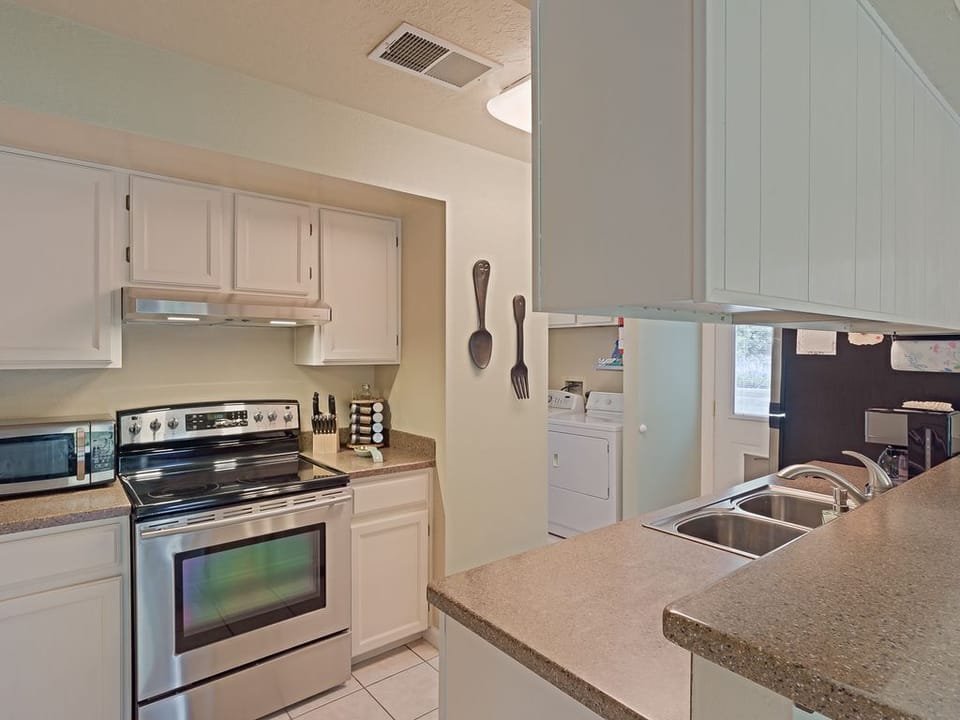Plenty of space and all  the necessities for a wonderful dinner in the kitchen 