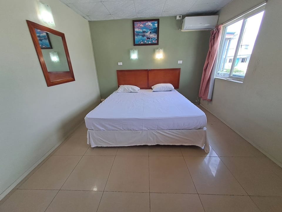 Double Room with Two Queen Beds | Desk, iron/ironing board, bed sheets