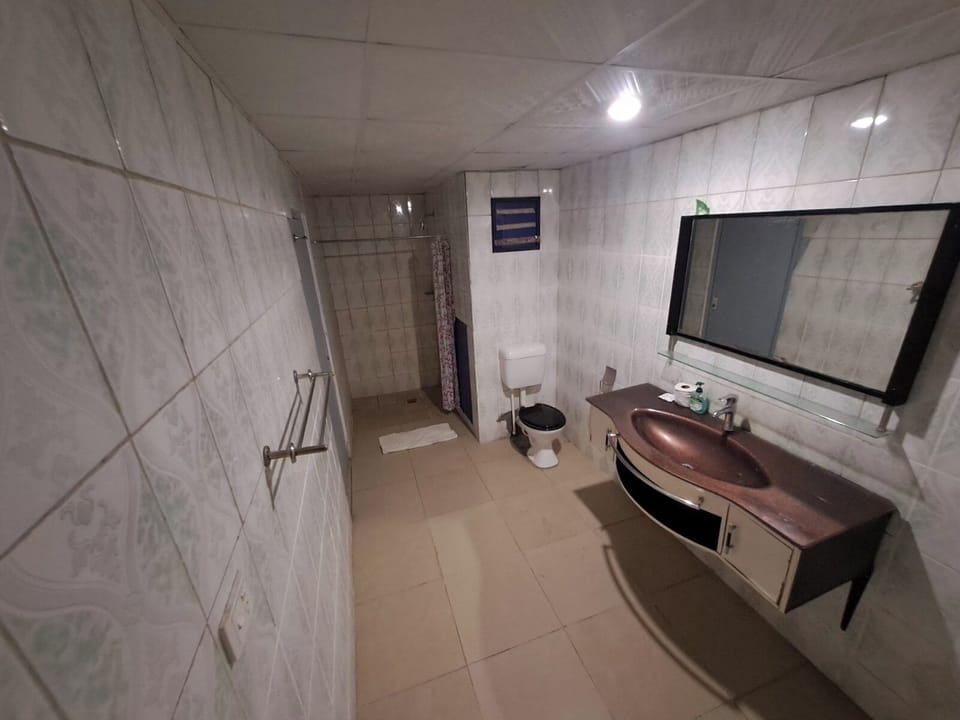 Double Room with Two Queen Beds | Bathroom | Shower, free toiletries, towels