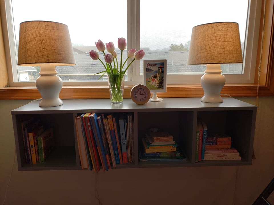 Bottom floor bunkbed room - books for kids, pack n' play, etc. 