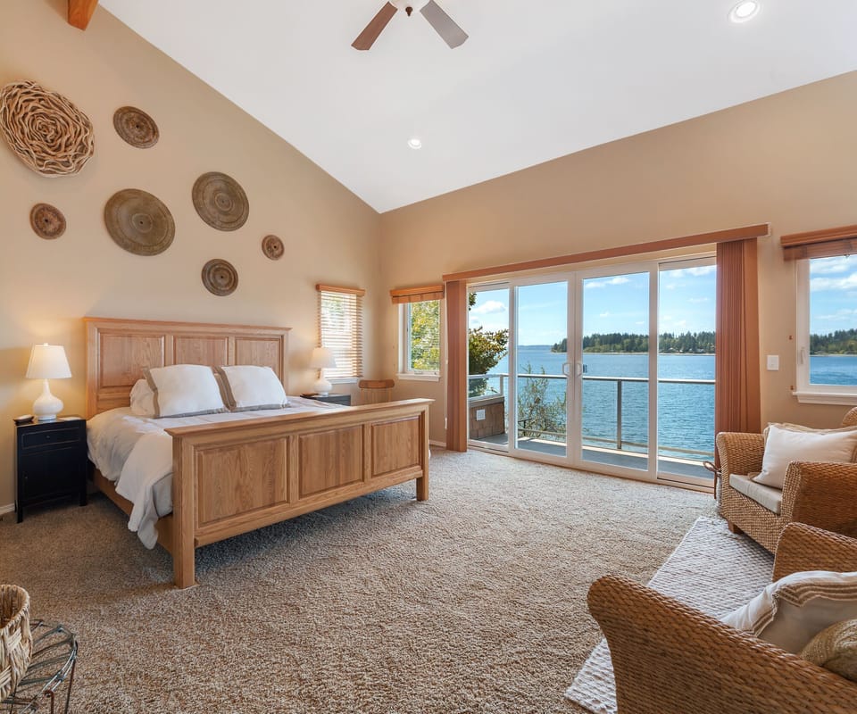 South Master Suite with king bed, en-suite with jetted tub, and private deck