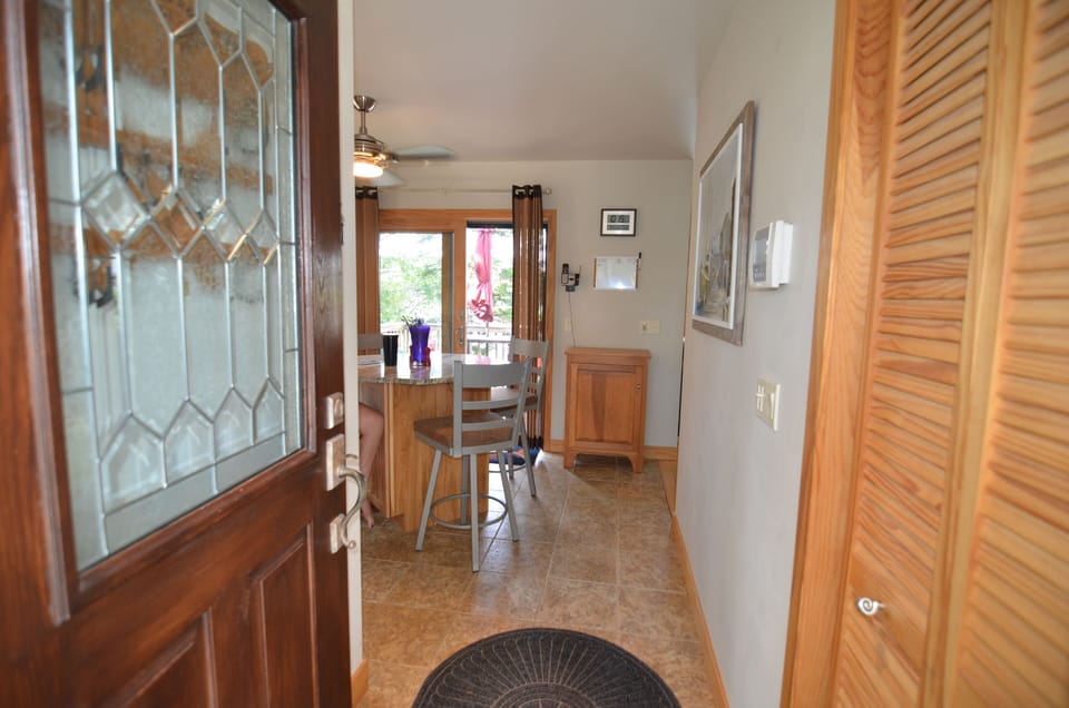 Entrance into the kitchen / dining area with slider onto the porch
