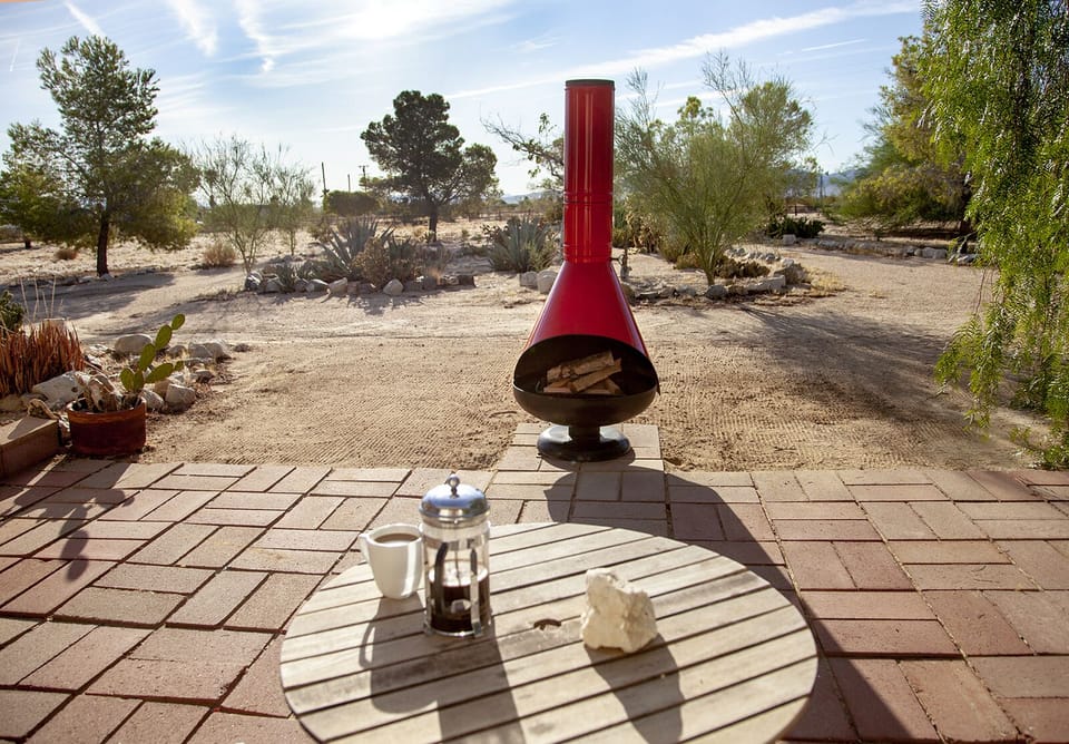 We just added an outdoor fireplace to take the nip off the high desert nights.