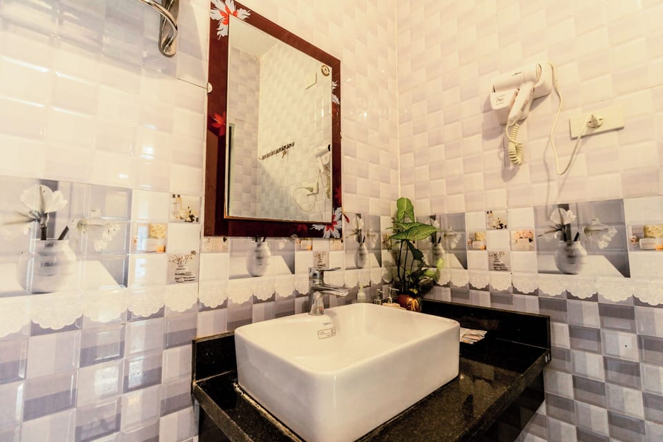 Shower, free toiletries, hair dryer, slippers