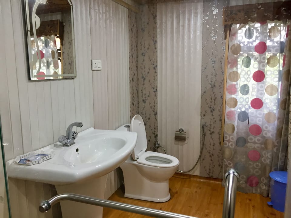Deluxe Room, Multiple Beds, Non Smoking | Bathroom | Combined shower/tub, deep soaking tub, hydromassage showerhead