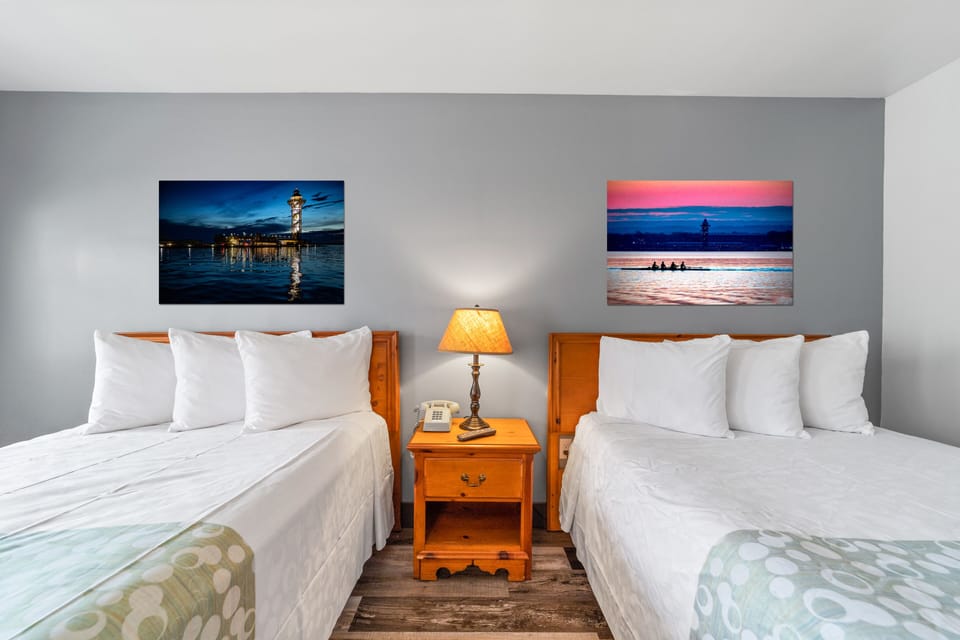 Family Room, Multiple Beds | Blackout drapes, iron/ironing board, free WiFi, bed sheets