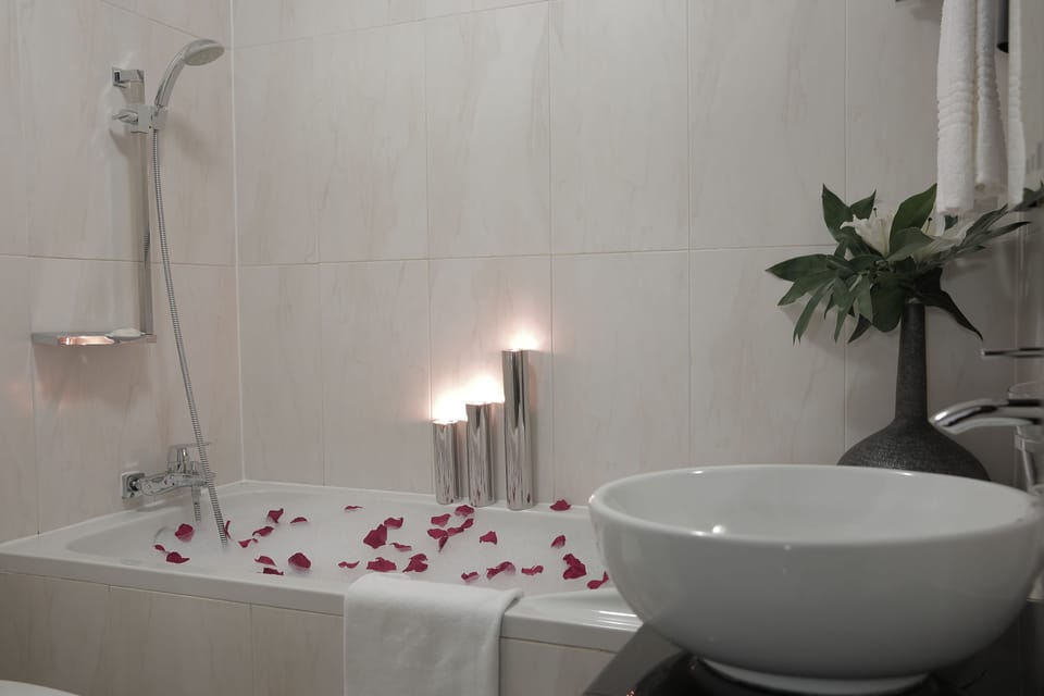 Designer toiletries, hair dryer (on request), towels