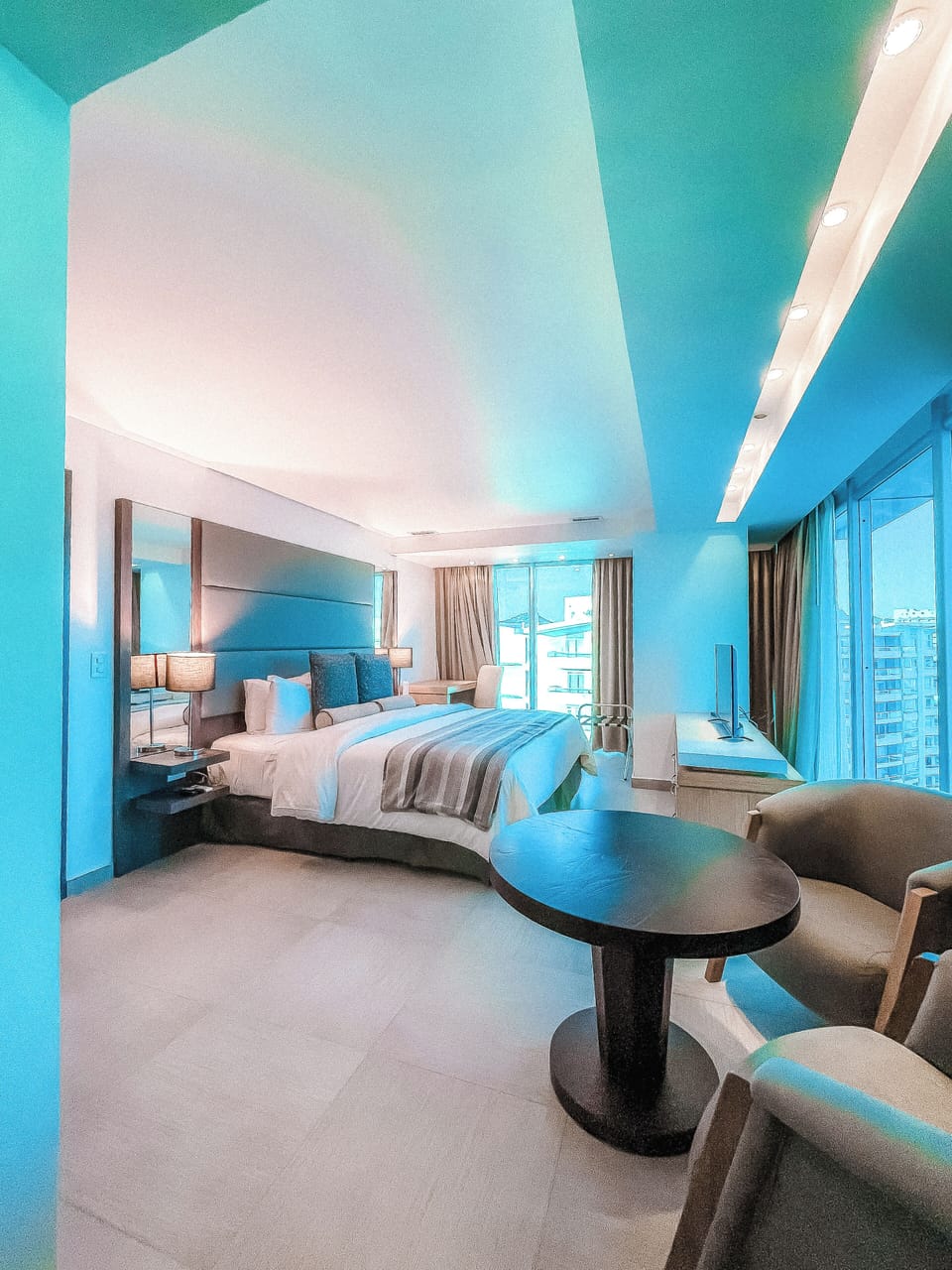 Junior Suite, Pool View | Minibar, desk, laptop workspace, iron/ironing board