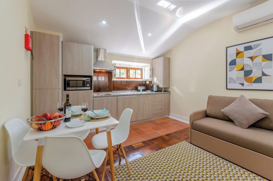 Standard Apartment | Living area | Flat-screen TV
