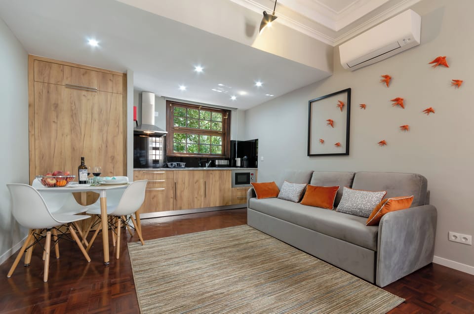 Superior Apartment | Living area | Flat-screen TV