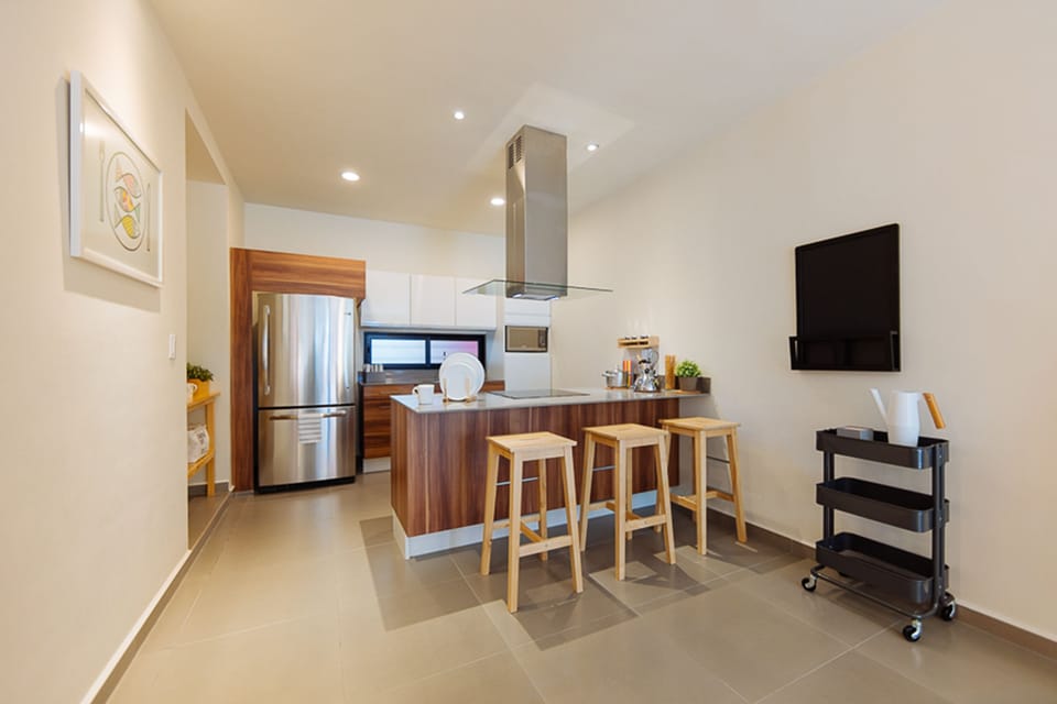 Apartment, 2 Bedrooms | Private kitchen | Fridge, microwave, stovetop, cookware/dishes/utensils