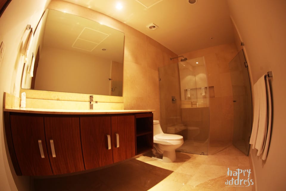 Apartment, 2 Bedrooms | Bathroom | Shower, free toiletries, hair dryer, towels