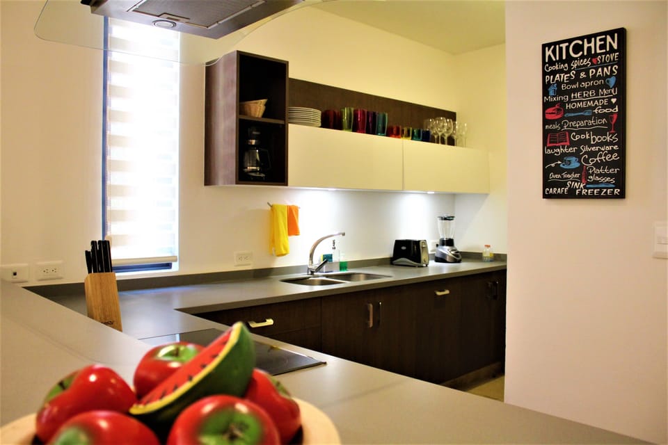Apartment, 2 Bedrooms | Private kitchen | Fridge, microwave, stovetop, cookware/dishes/utensils
