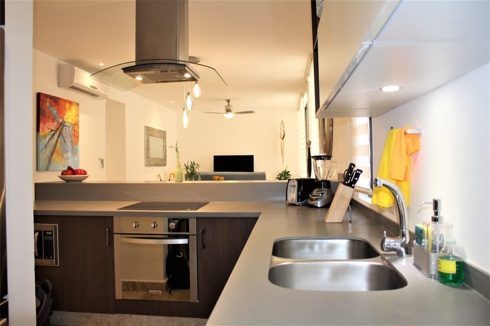 Apartment, 2 Bedrooms | Private kitchen | Fridge, microwave, stovetop, cookware/dishes/utensils