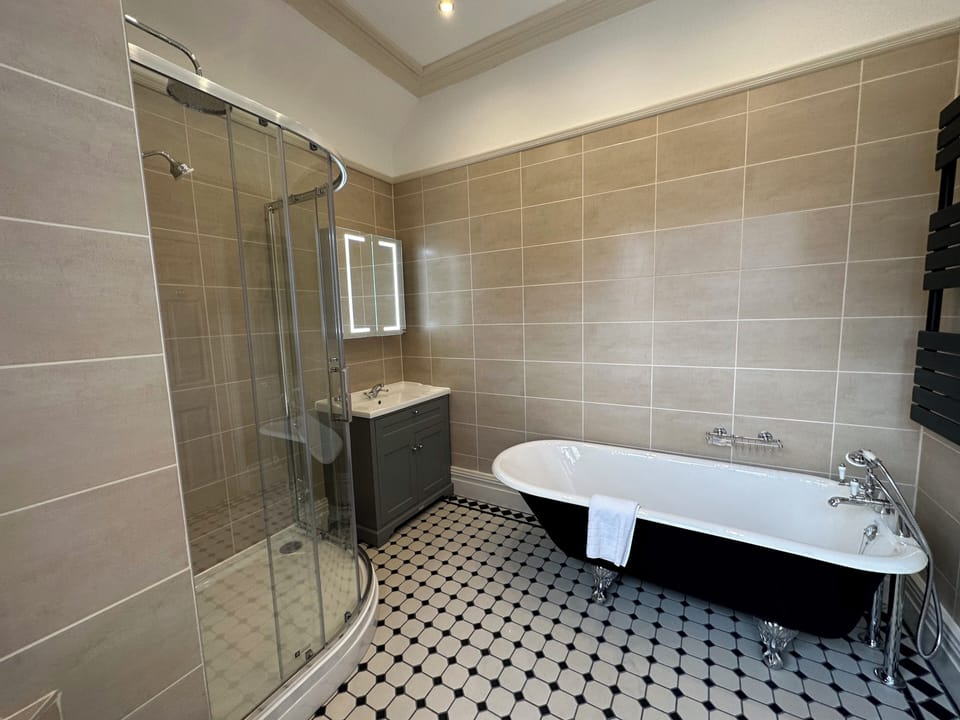 Exclusive Room, Non Smoking, Bathtub | Bathroom | Free toiletries, hair dryer, towels, soap
