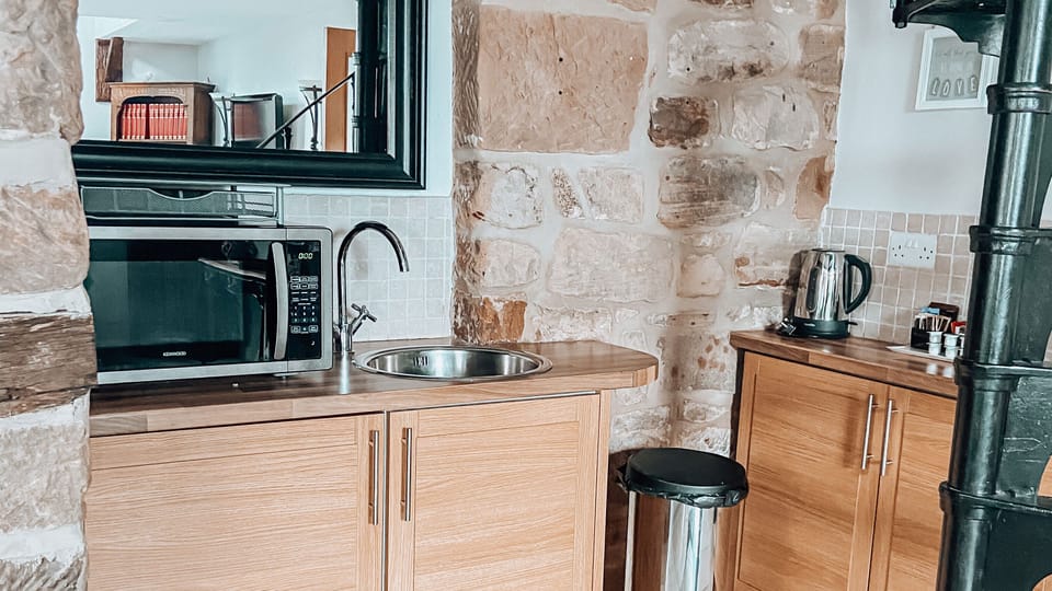 Luxury Suite | Private kitchen | Shared fridge, coffee/tea maker, electric kettle