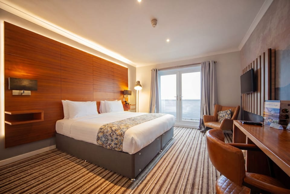 Executive Double Room | Desk, blackout drapes, iron/ironing board (on request), WiFi (free)