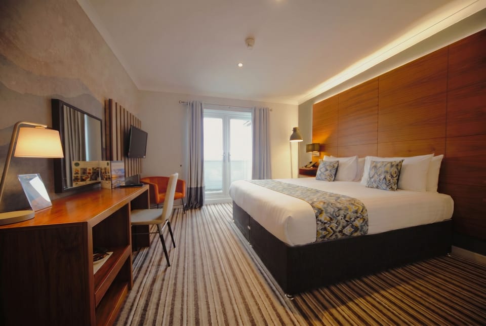 Executive Double Room | Desk, blackout drapes, iron/ironing board (on request), WiFi (free)