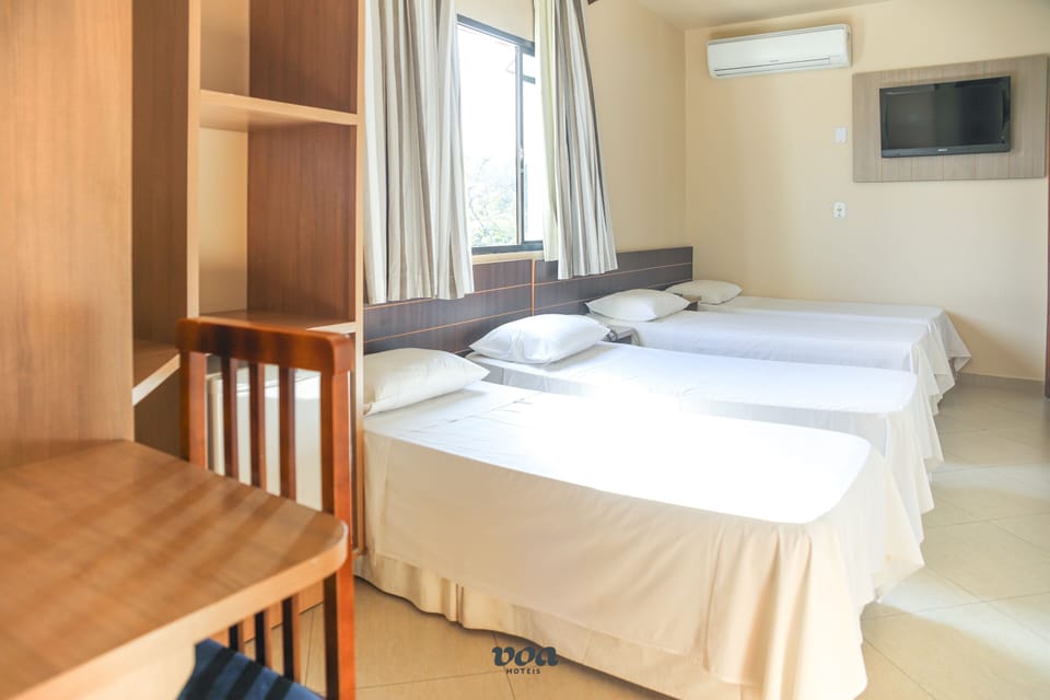 Standard Quadruple Room | Minibar, desk, free WiFi, bed sheets