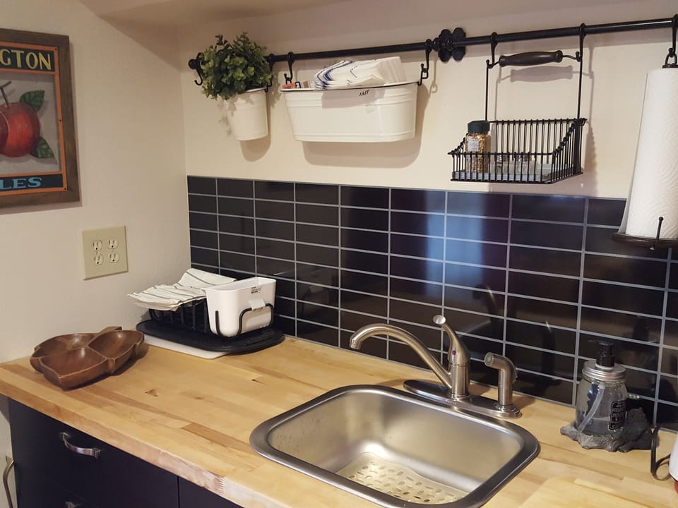 kitchenette has toaster oven, microwave oven and coffeemaker