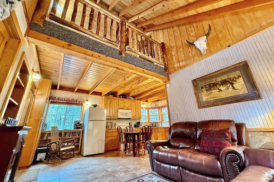 Cozy cabin living at HappyOur Ranch in Glendale, UT! Relax by the fire or cook a delicious meal in our fully equipped kitchen.