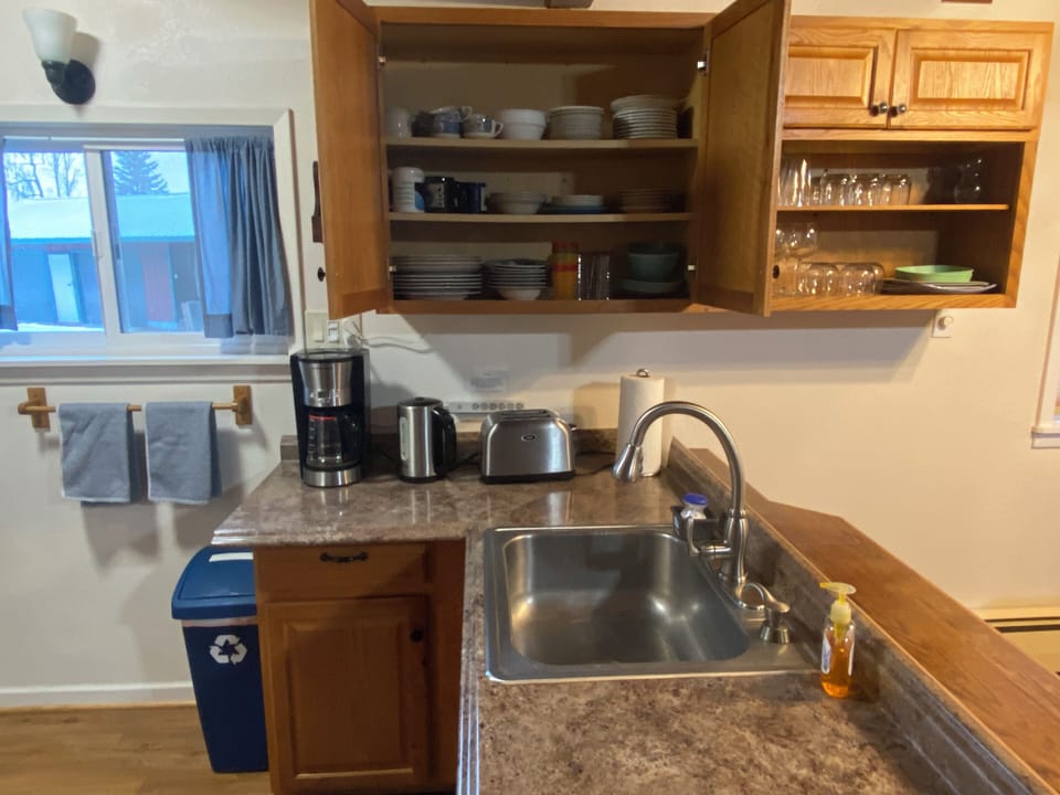 Kitchen counter with sink & appliances