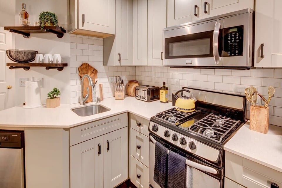 Well-equipped kitchen with modern essentials and clean design.