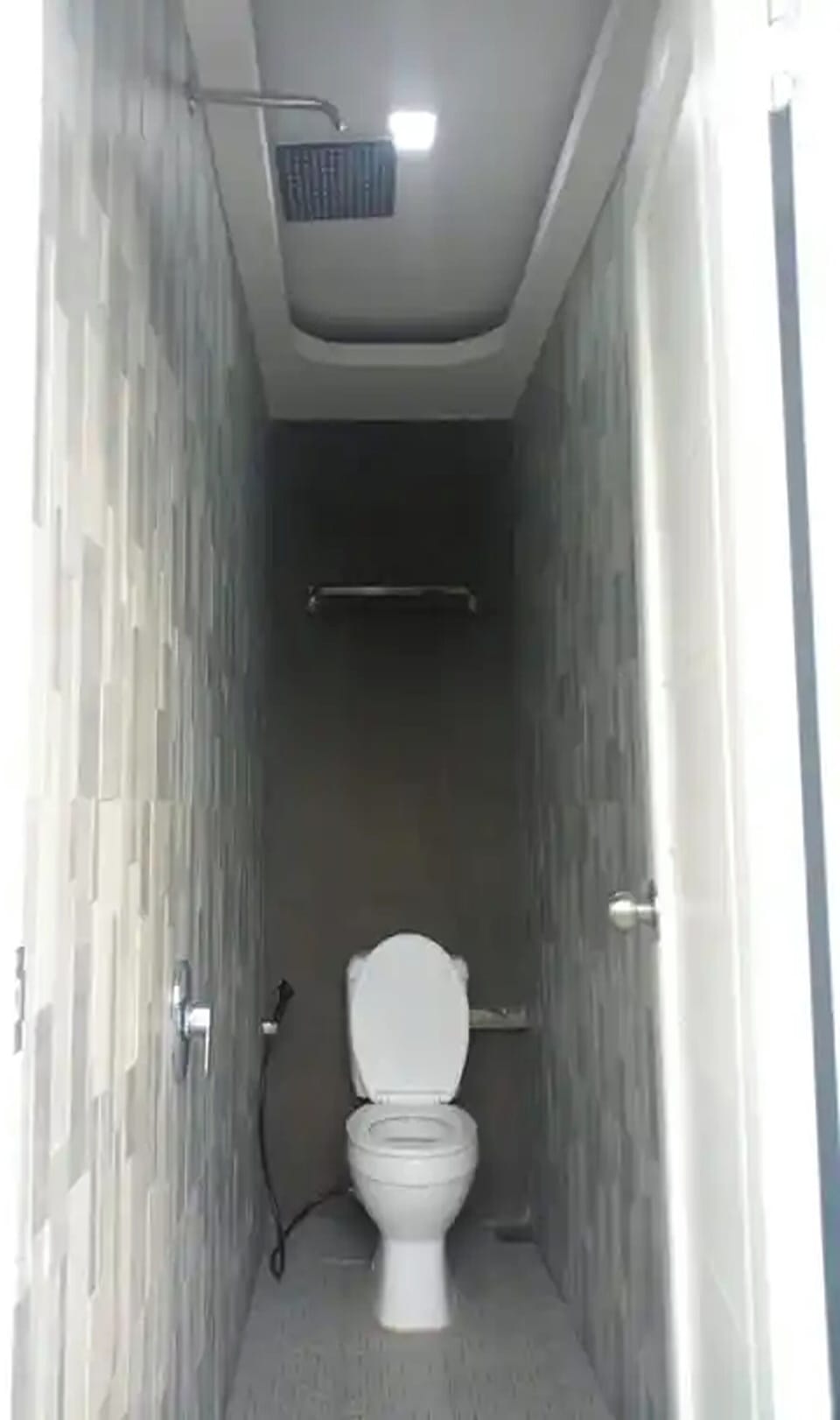 Shower, rainfall showerhead, slippers, towels