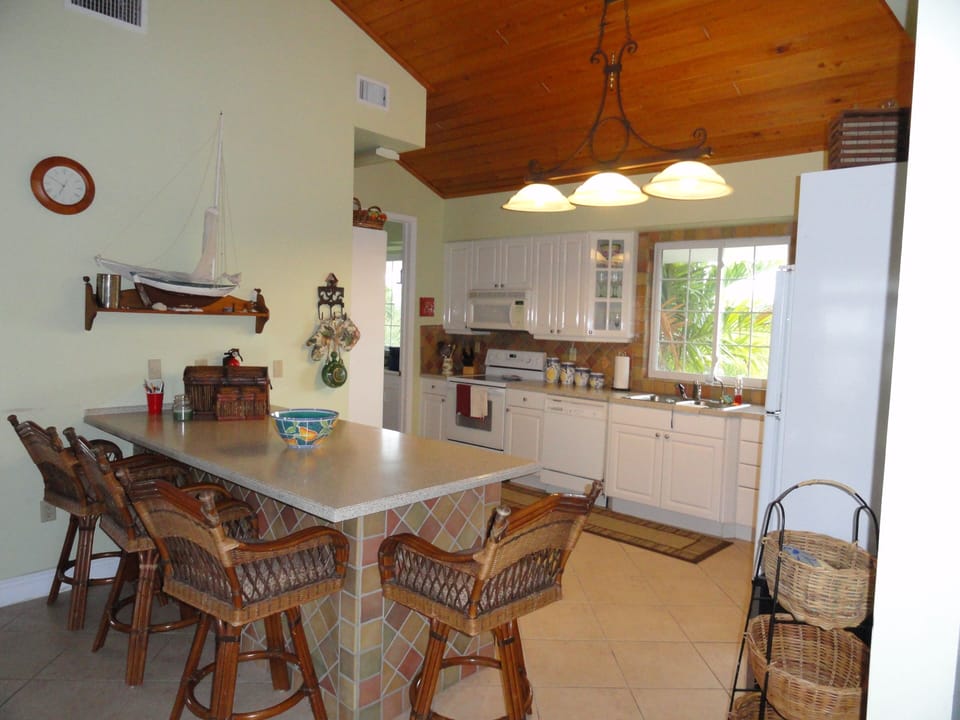 GOURMET KITCHEN WITH ATTACHED FULL LAUNDRY