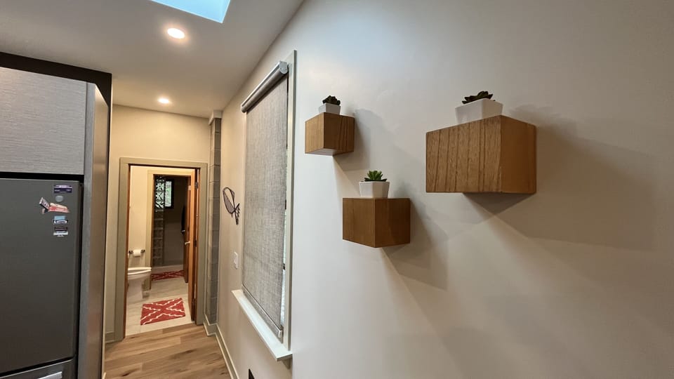 Hallway looking into upstairs bath