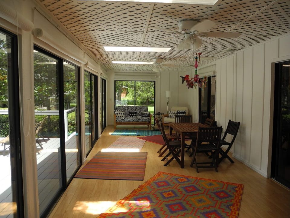 Large 35ft sunroom has incredible water view across 3 levels of deck and dock. 