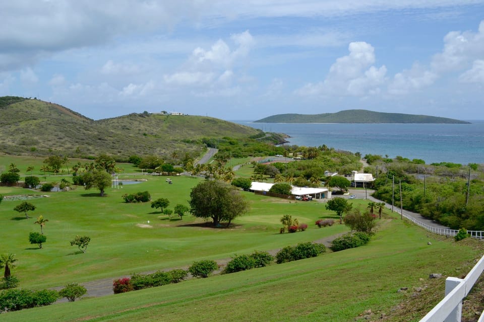 Golf is just over the hill; or use the 2 racquets for the onsite tennis court
