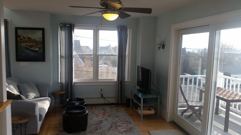 Living room TV area with ocean view