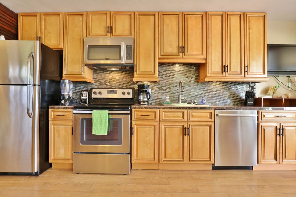 Gourmet kitchen with 12-cup coffee pot & blender.  Loaded with cooking utensils.