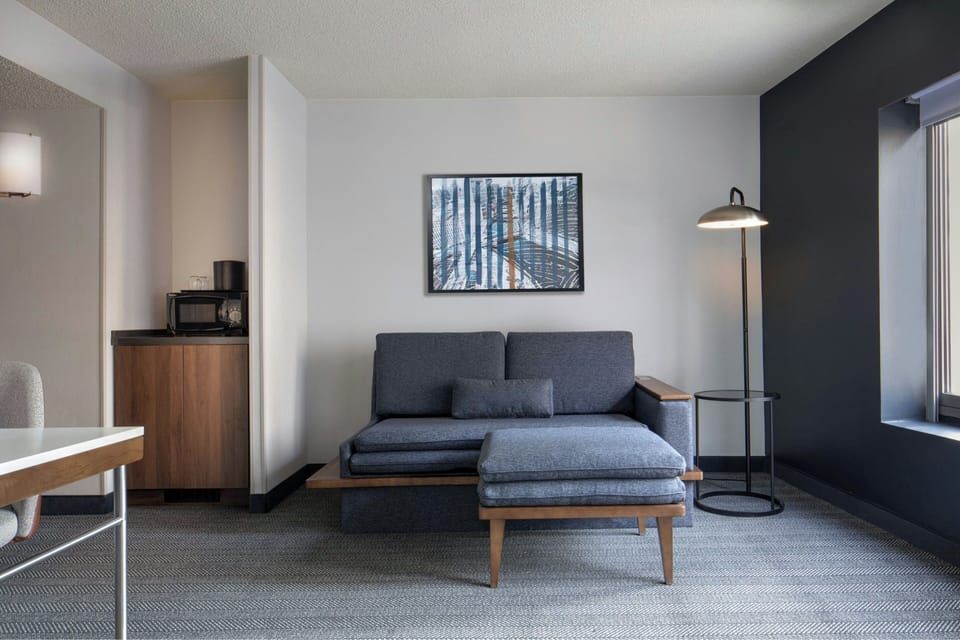 Suite, 1 Bedroom | Living area | 55-inch Smart TV with satellite channels, Netflix, streaming services