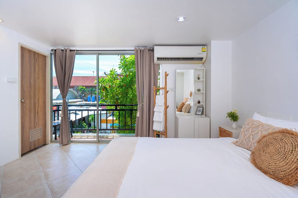 King Room with Balcony | In-room safe, desk, blackout drapes, free WiFi