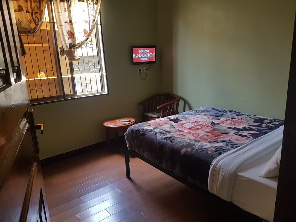 Double Room | Blackout drapes, iron/ironing board, WiFi (free), bed sheets