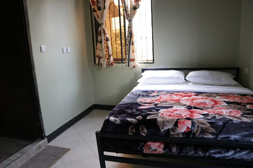 Double Room | Blackout drapes, iron/ironing board, WiFi (free), bed sheets
