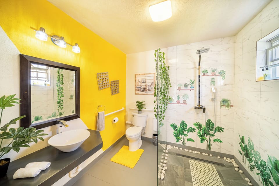 Deluxe Room, Pool Access, Ground Floor (Serenity Room) | Bathroom | Shower, rainfall showerhead, free toiletries, hair dryer