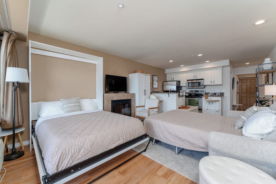 Comfortable sleeping accommodations for 4 with a queen size sofa sleeper and a double Murphy bed!