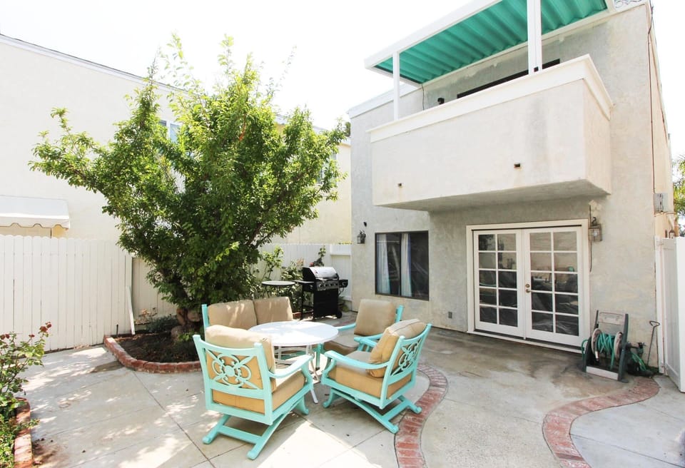 Back patio and Master bedroom balcony