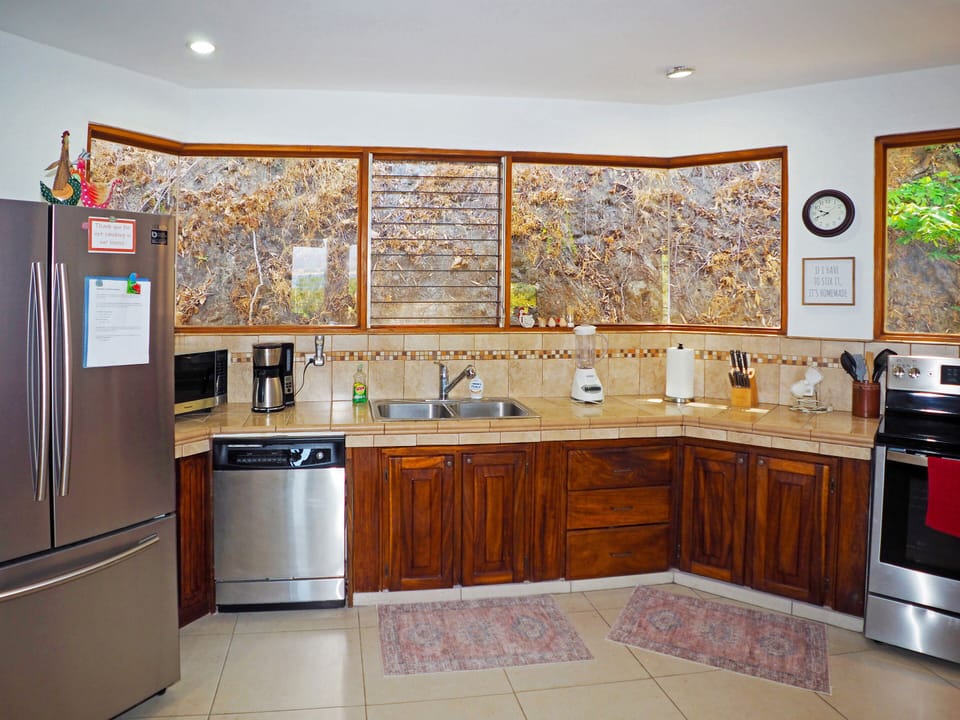 Kitchen with large pantry on the left.