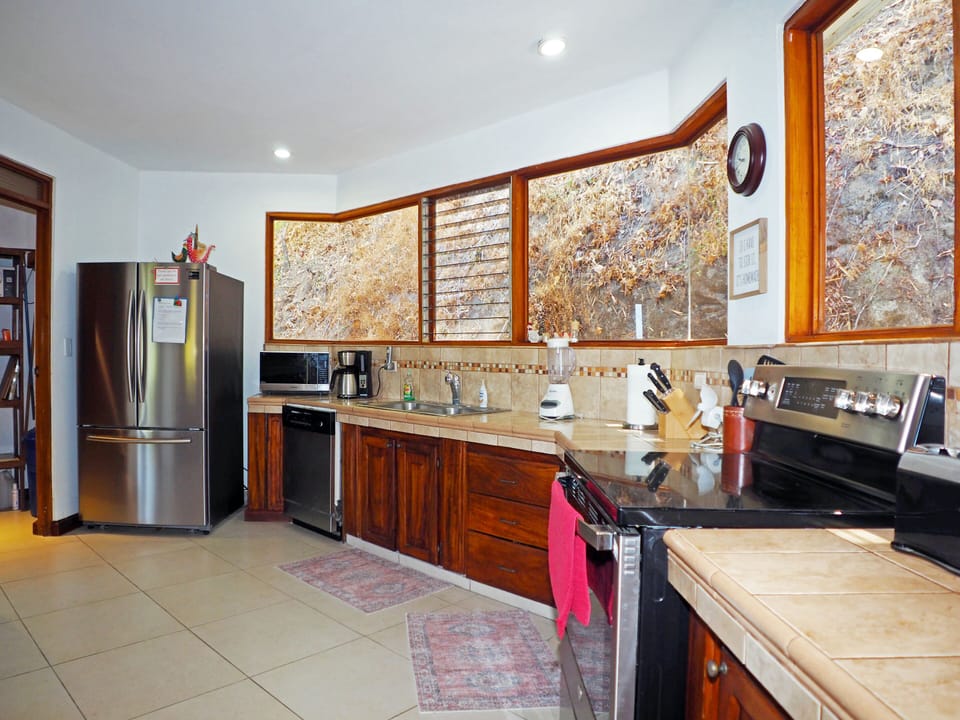 Kitchen with large pantry on the left.