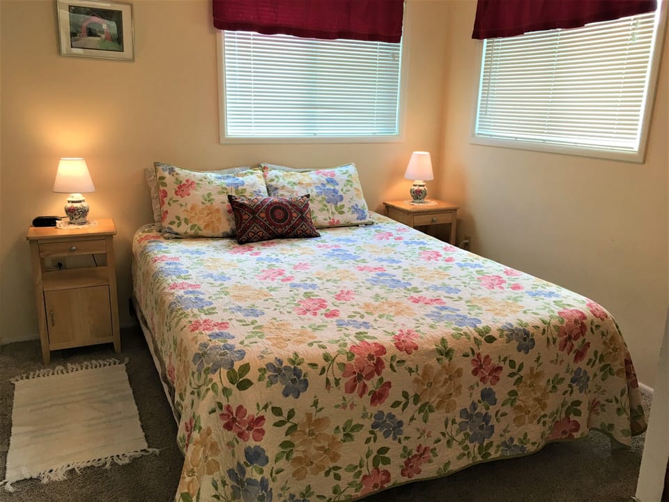 West bedroom with queen bed.